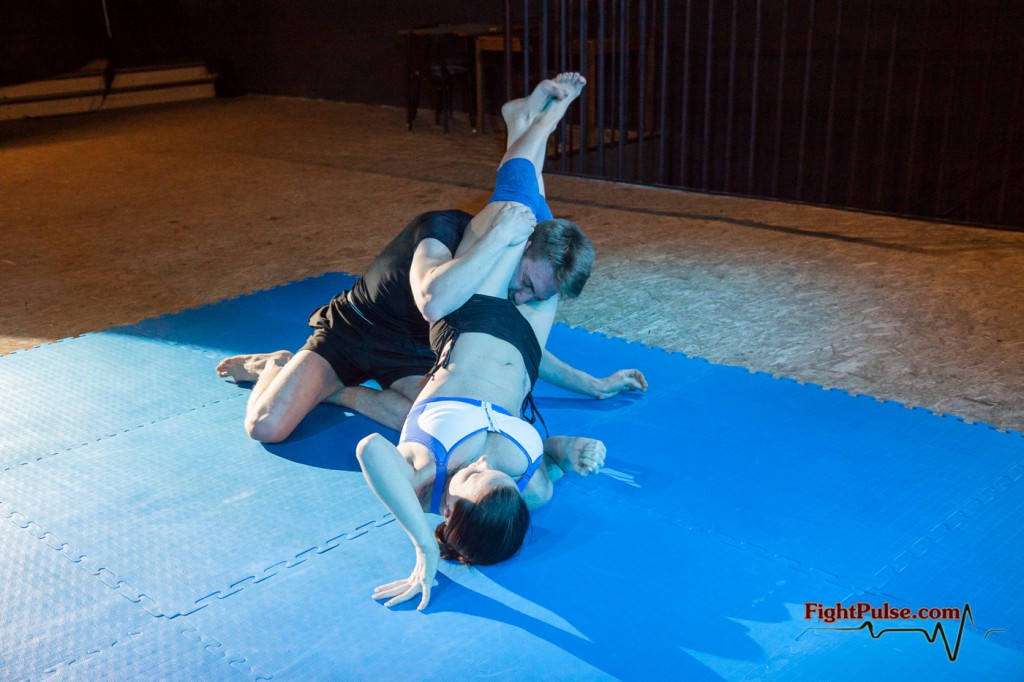 Ryan in pain between Zsuzsa's strong legs