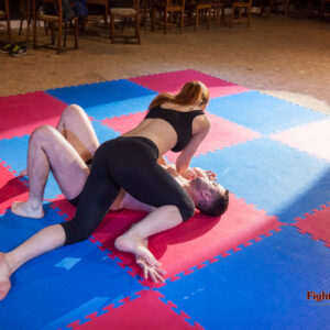 Akela going for a cross-body pin