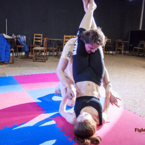 Akela's strong thighs wrapped tightly around Patrick's neck