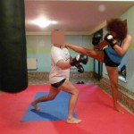 Alice - wrestler from Poland kicking a man
